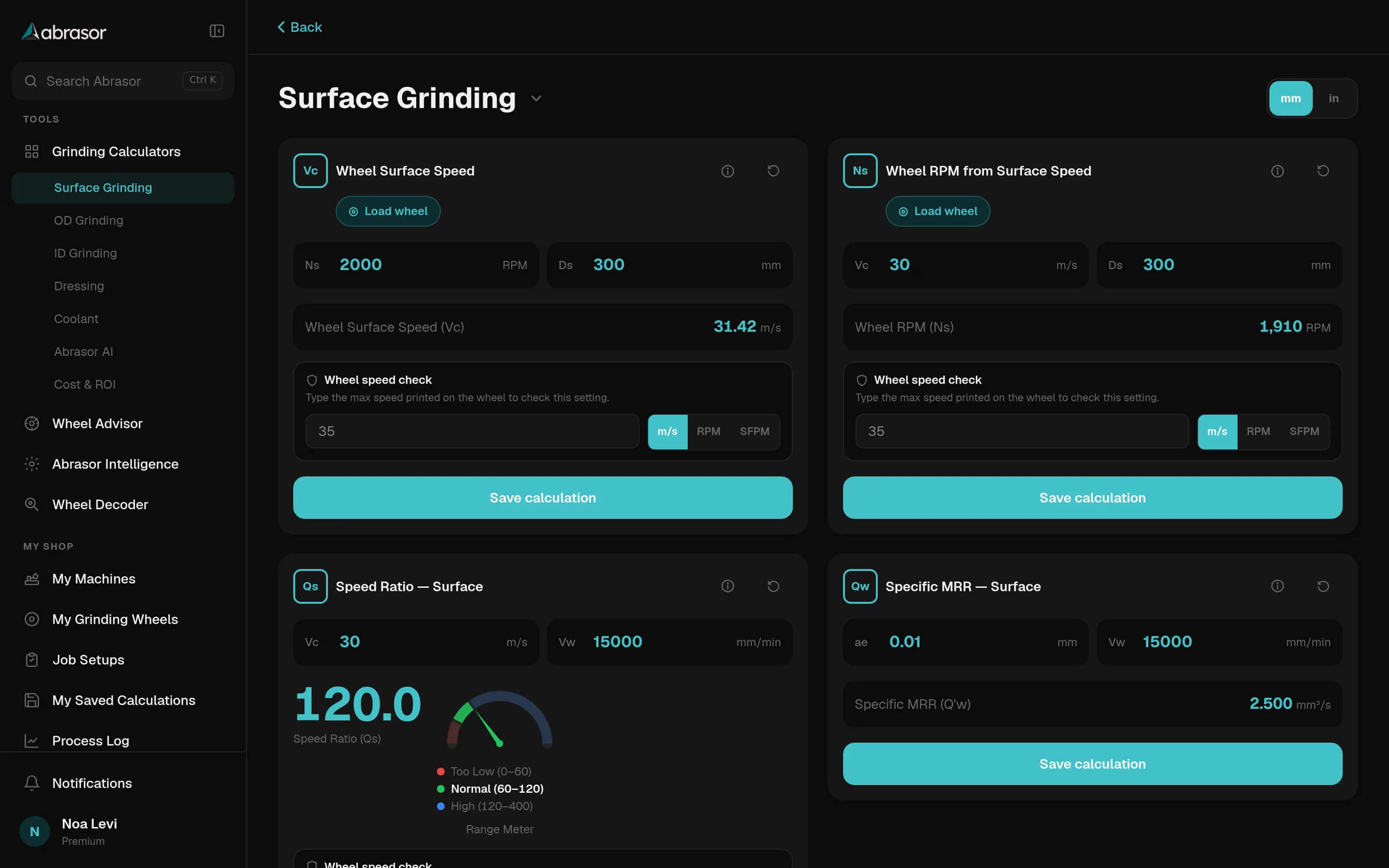 Abrasor surface grinding calculators on a desktop: wheel surface speed, wheel RPM, speed ratio and specific removal rate, filled in with results