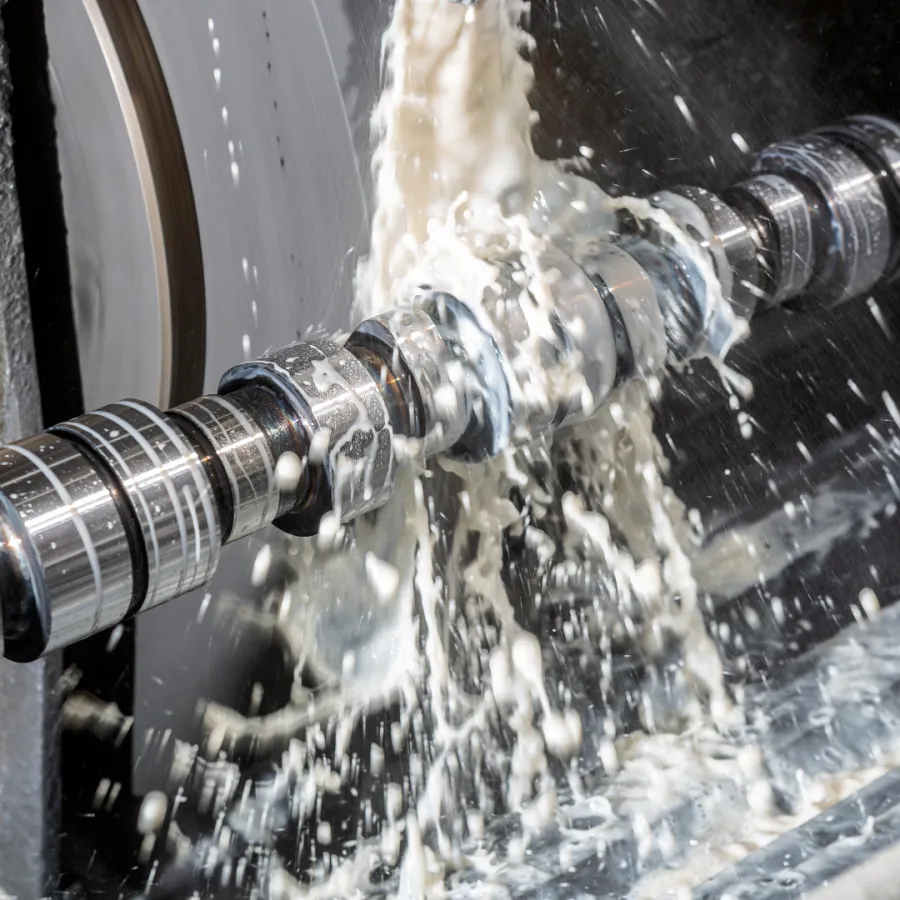 Coolant flooding a part during grinding